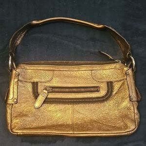 BCBGMaxAzria Gold Shoulder Bag with Textured Leather and Curved Handle